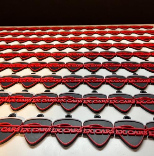 Création de porte-clé pour un garage de voitures d’occasion par notre société d’impression 3D.