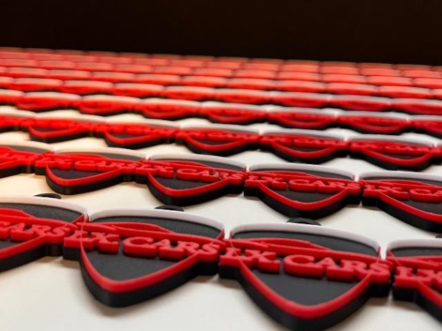 Création de porte-clés pour un garage de voitures d’occasion. 